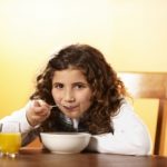GirlEatingBreakfast GirlEatingBreakfast