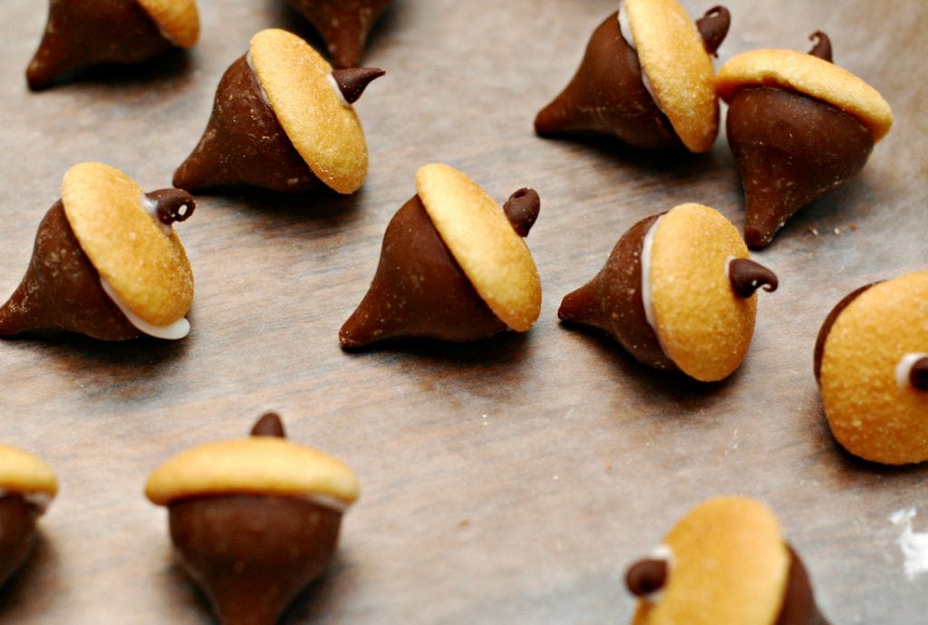 Acorn cookies assembled to place on top of snickerdoodle cupcakes 