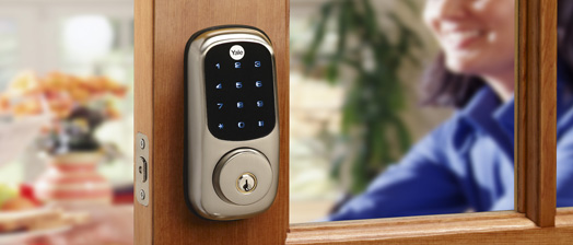 Yale Real Living US15Touchscreen_woman at door_524x224
