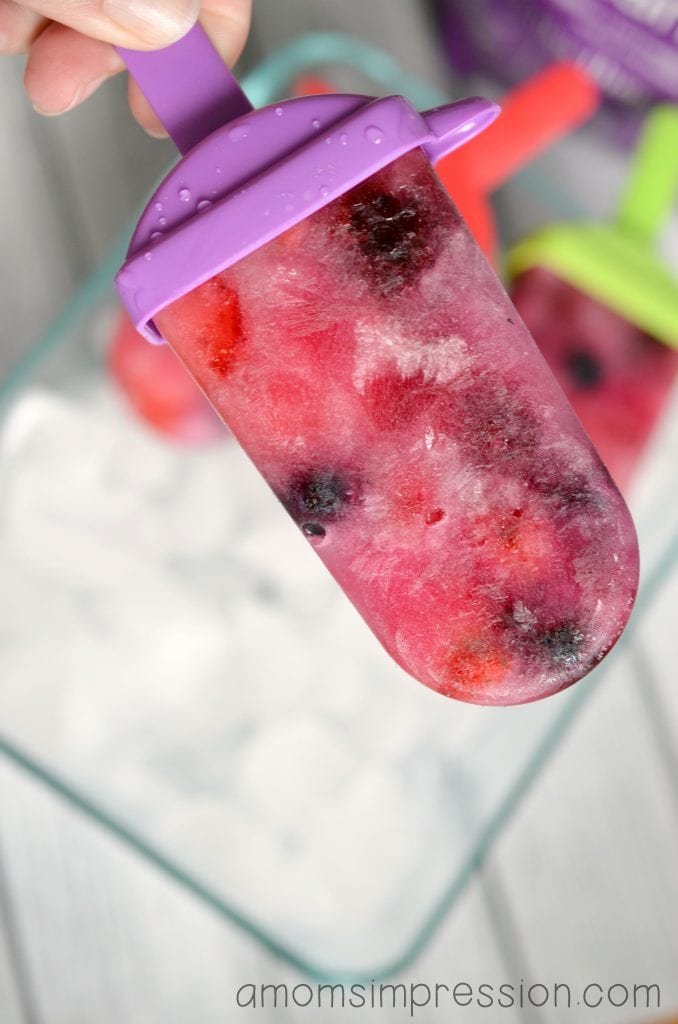healthy homemade popsicle being eaten.