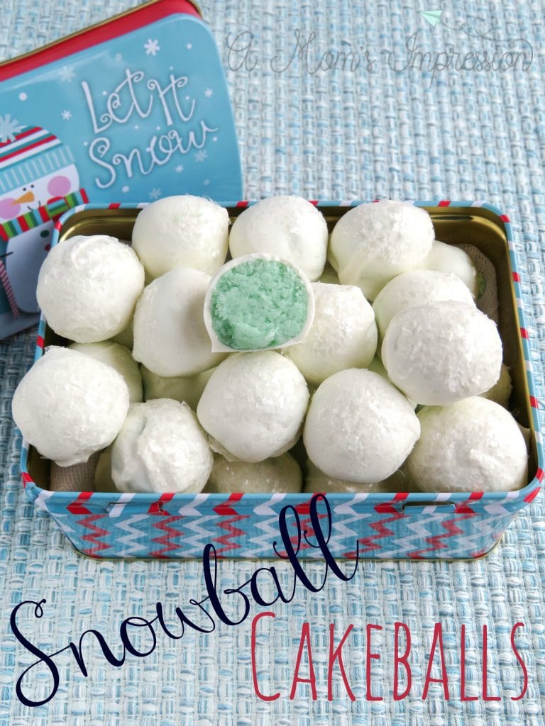 This snowball cake balls are the perfect cake pop recipe for your Christmas party this year! One of the easiest Christmas dessert recipes there is and they're both fun and festive! #ChristmasRecipes