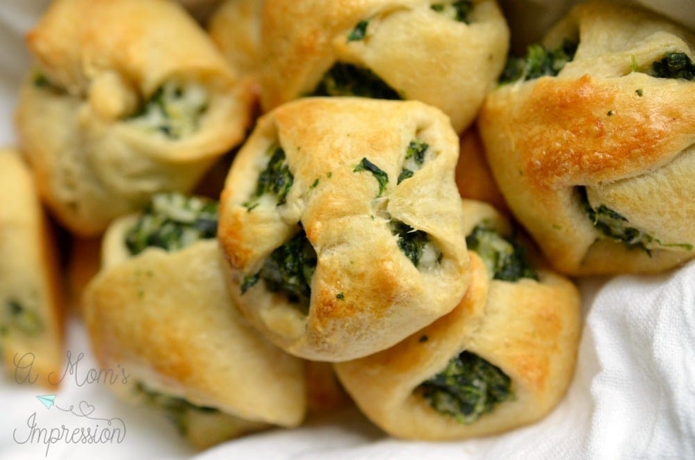 Spinach Crescent Roll Appetizers sitting on an appetizer plate