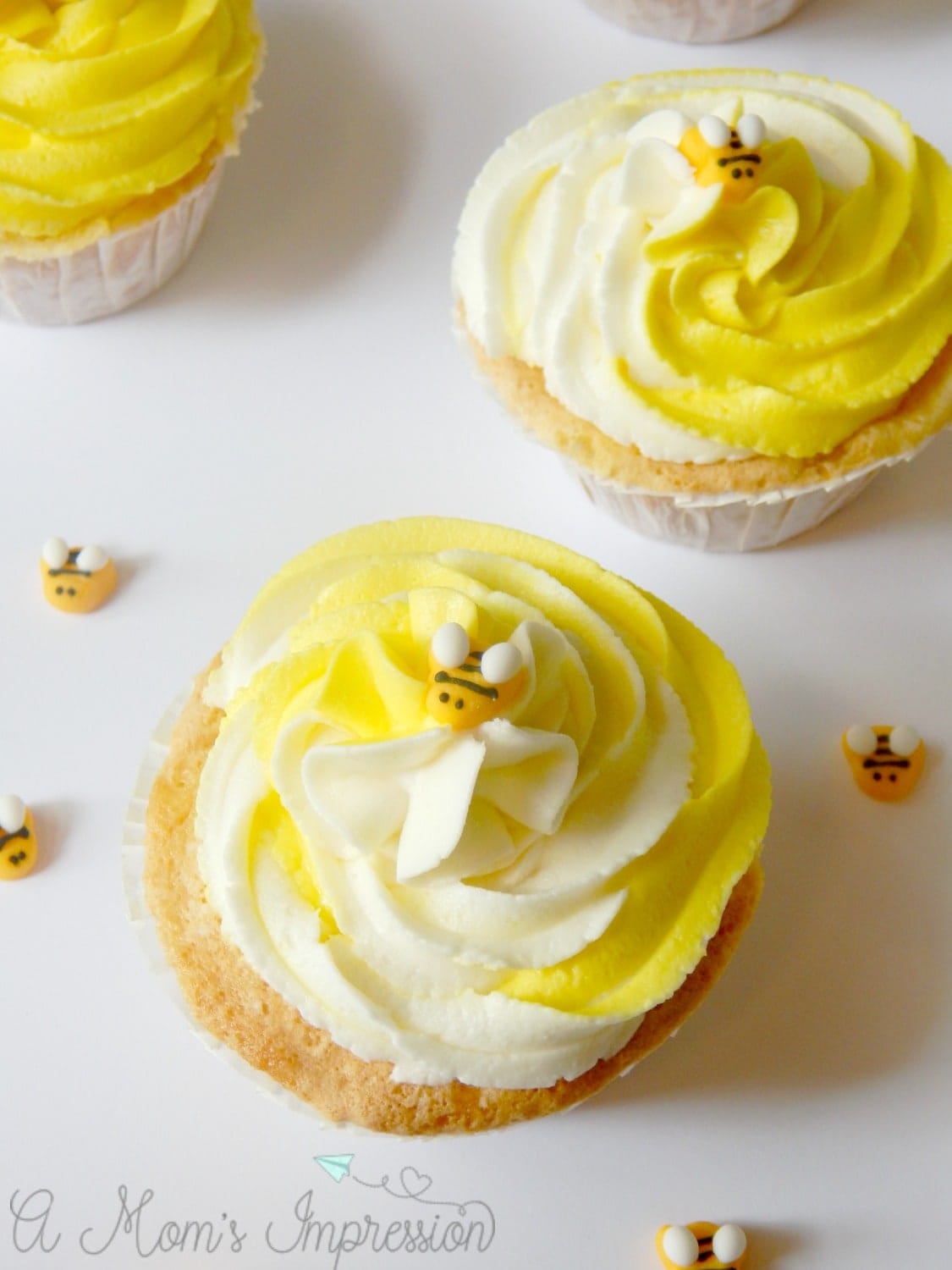 These easy bumblebee cupcakes would be perfect for a birthday party or other summer occasion! The almond frosting recipe is great for all kinds of dessert recipes as well - you'll want to pin this one for later! #ad