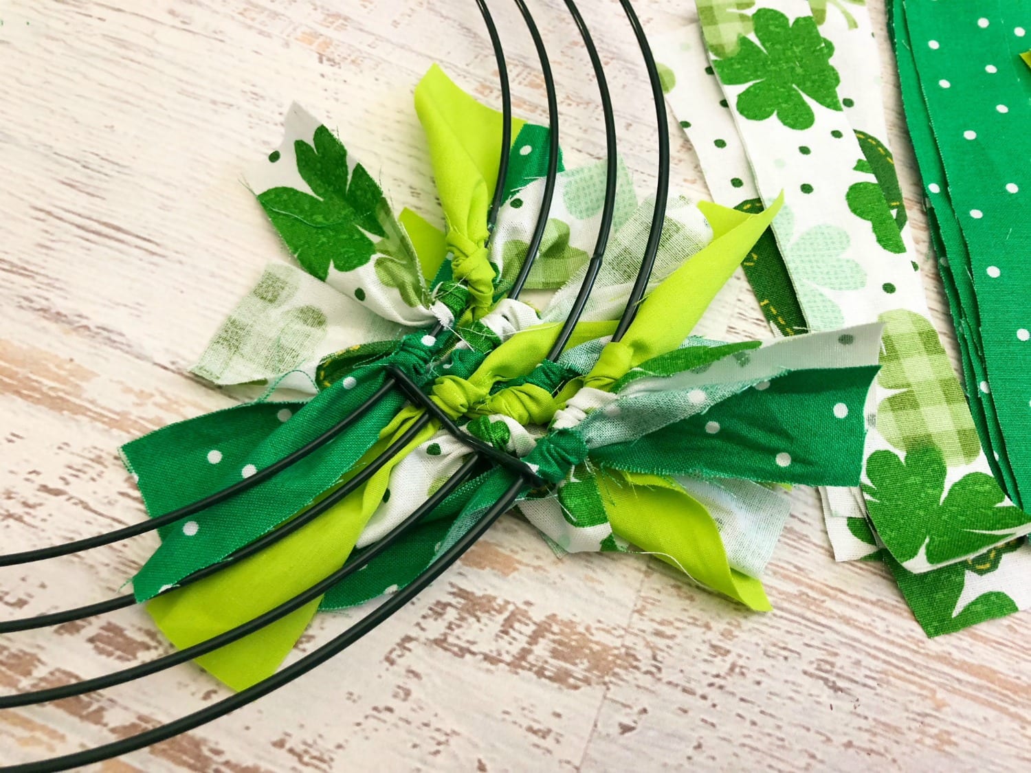 3 heart shaped wire wreath forms wrapped with rubber drawer liner.  Diy st  patricks day wreath, St patrick's day decorations, Wreaths st patricks