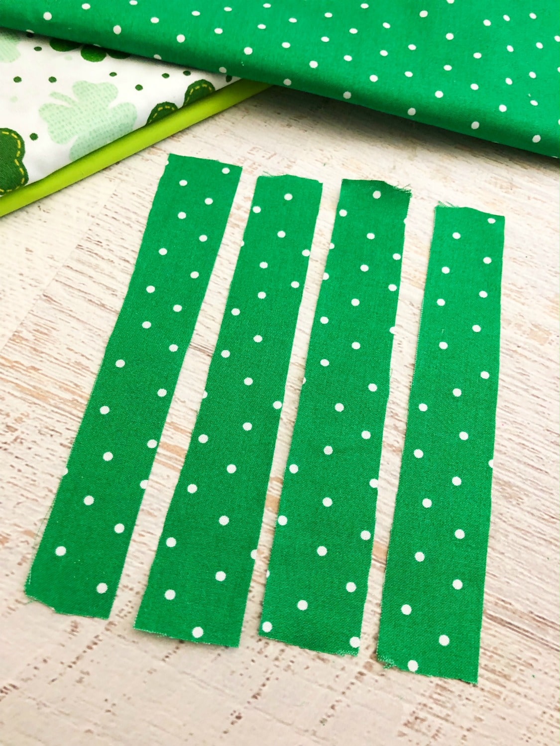 St. Patrick's Day fabric cut into strips