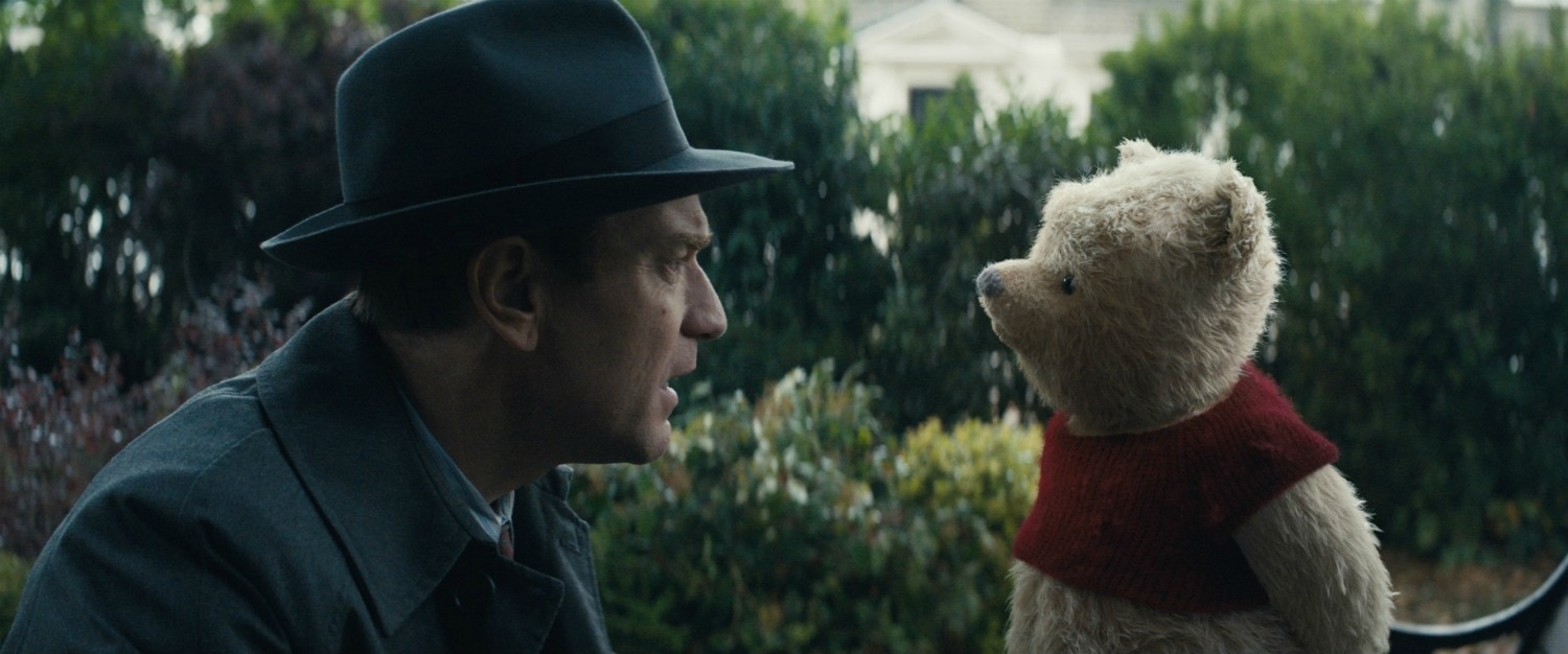 Pooh Bear and Christopher Robin talking