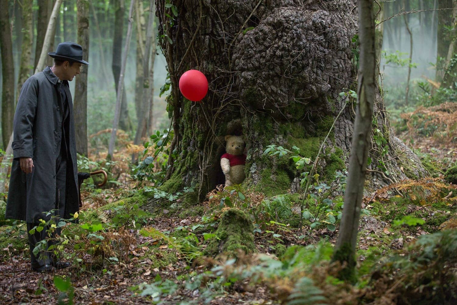 Christopher Robin (Ewan McGregor) and his longtime friend Winnie the Pooh in Disney’s live-action adventure CHRISTOPHER ROBIN.
