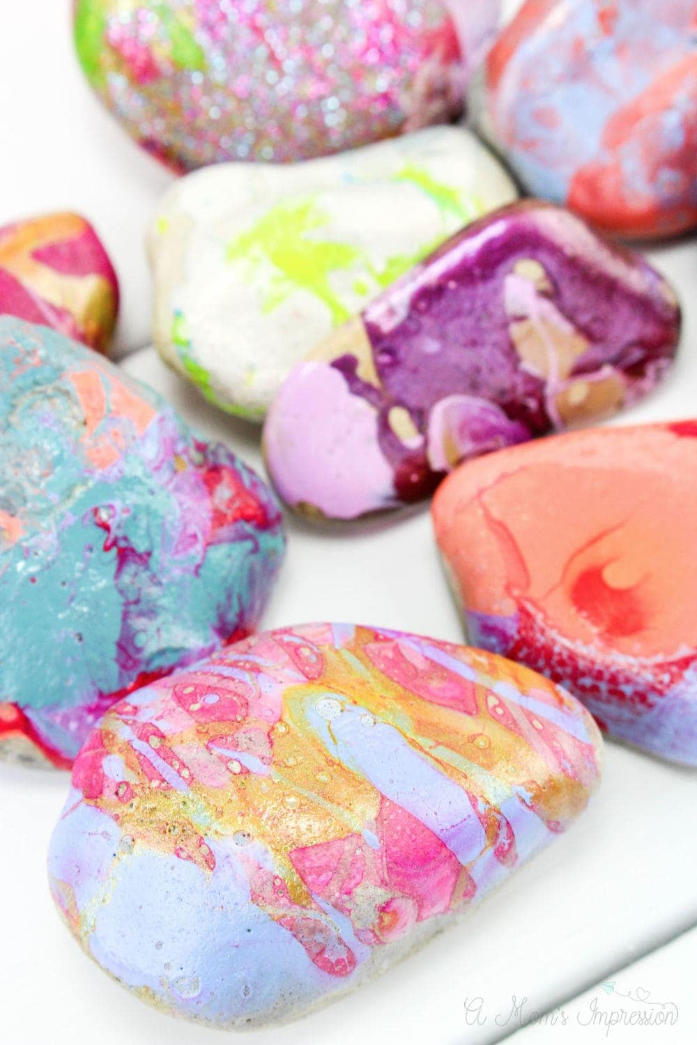 marbled painted rocks on display