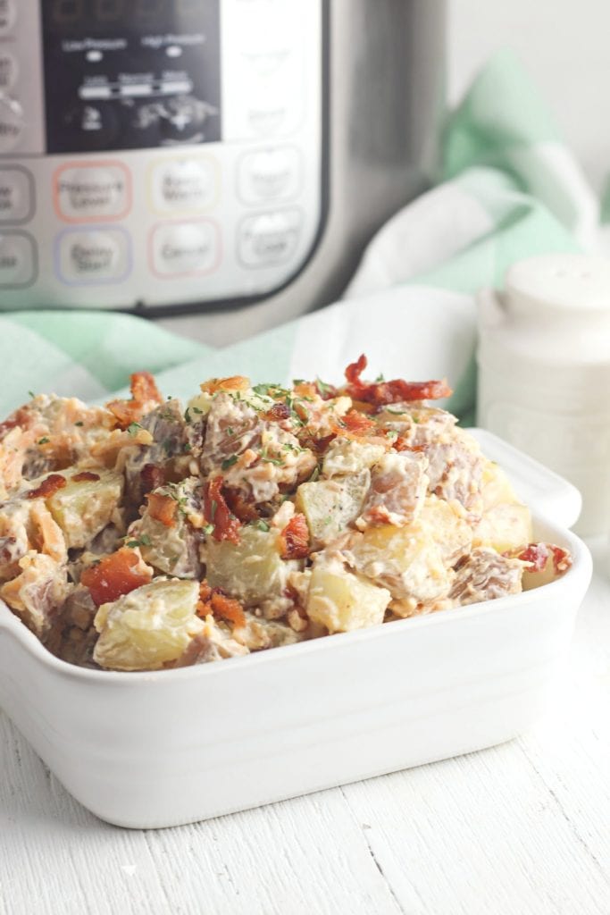Instant Pot Potato Salad made with sour cream, cheese and bacon in your pressure cooker.