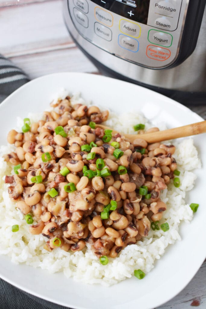 Pressure Cooker Hoppin' John has black eyed peas, onions and celery.