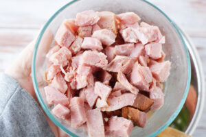 Diced Ham going into Instant Pot.
