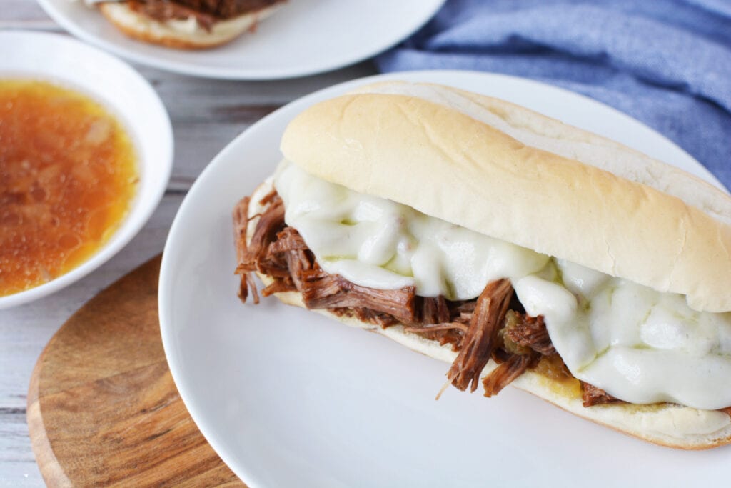 Instant Pot French Dip Sandwich being served on a white plate.