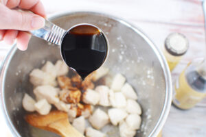 Add soy sauce, honey, water and ginger to chicken