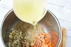 Add broth to instant pot