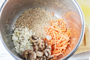 Add carrots, onions and mushrooms